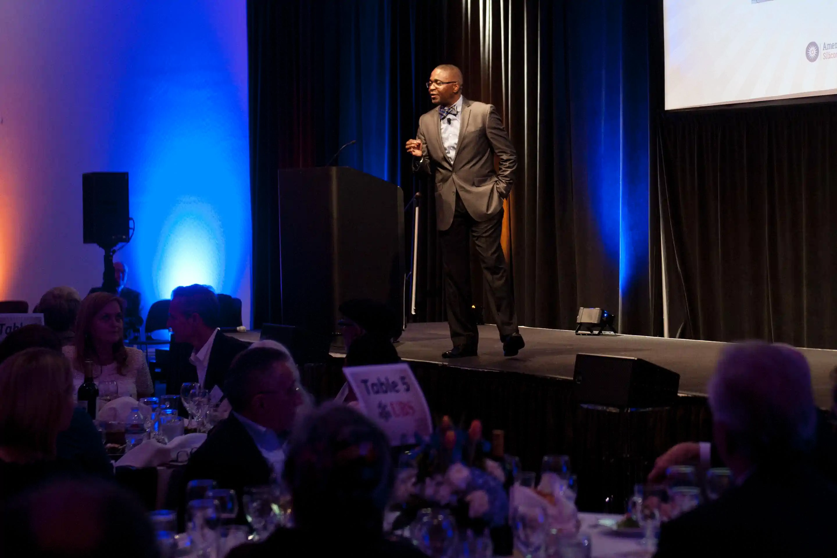 Chike speaking on stage